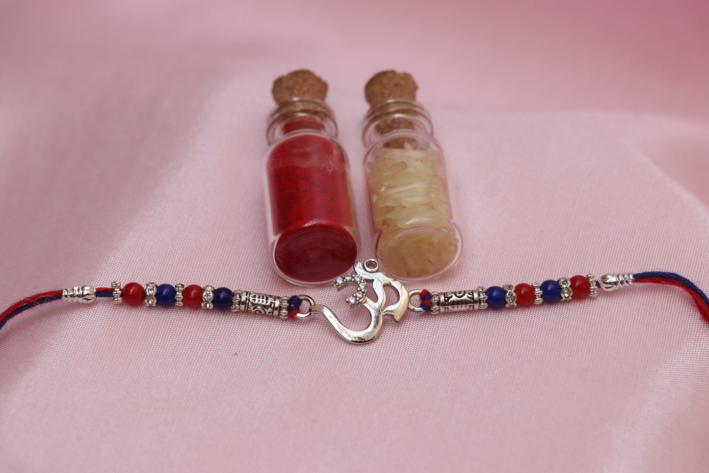 Om Silver Rakhi