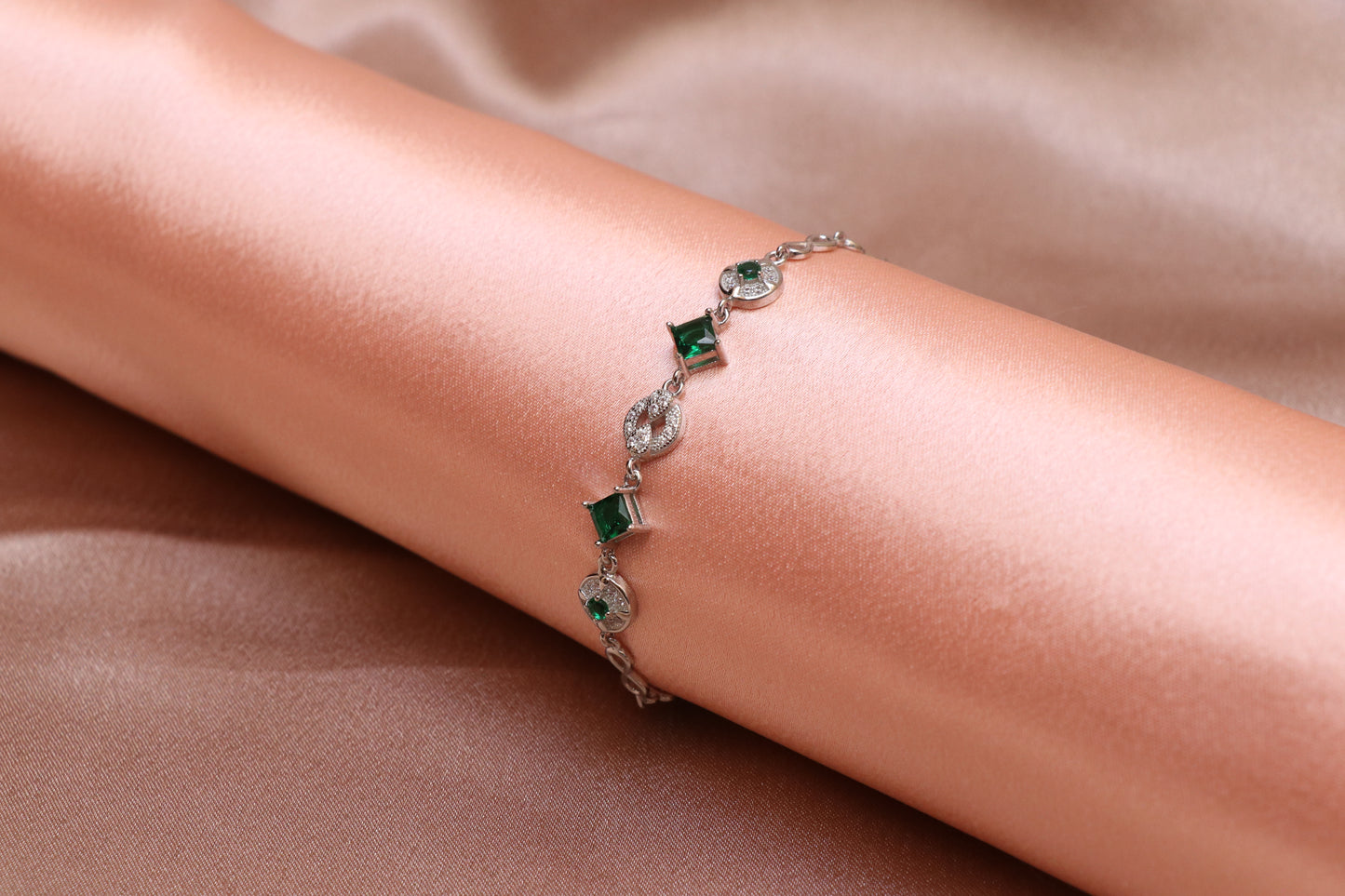 Emerald Infinity Silver Chain Bracelet