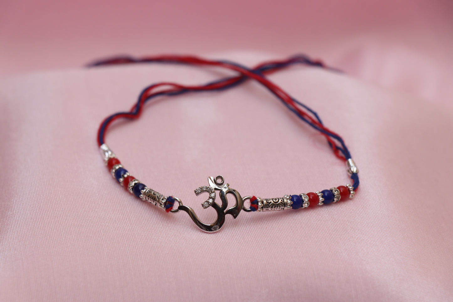 Om Silver Rakhi