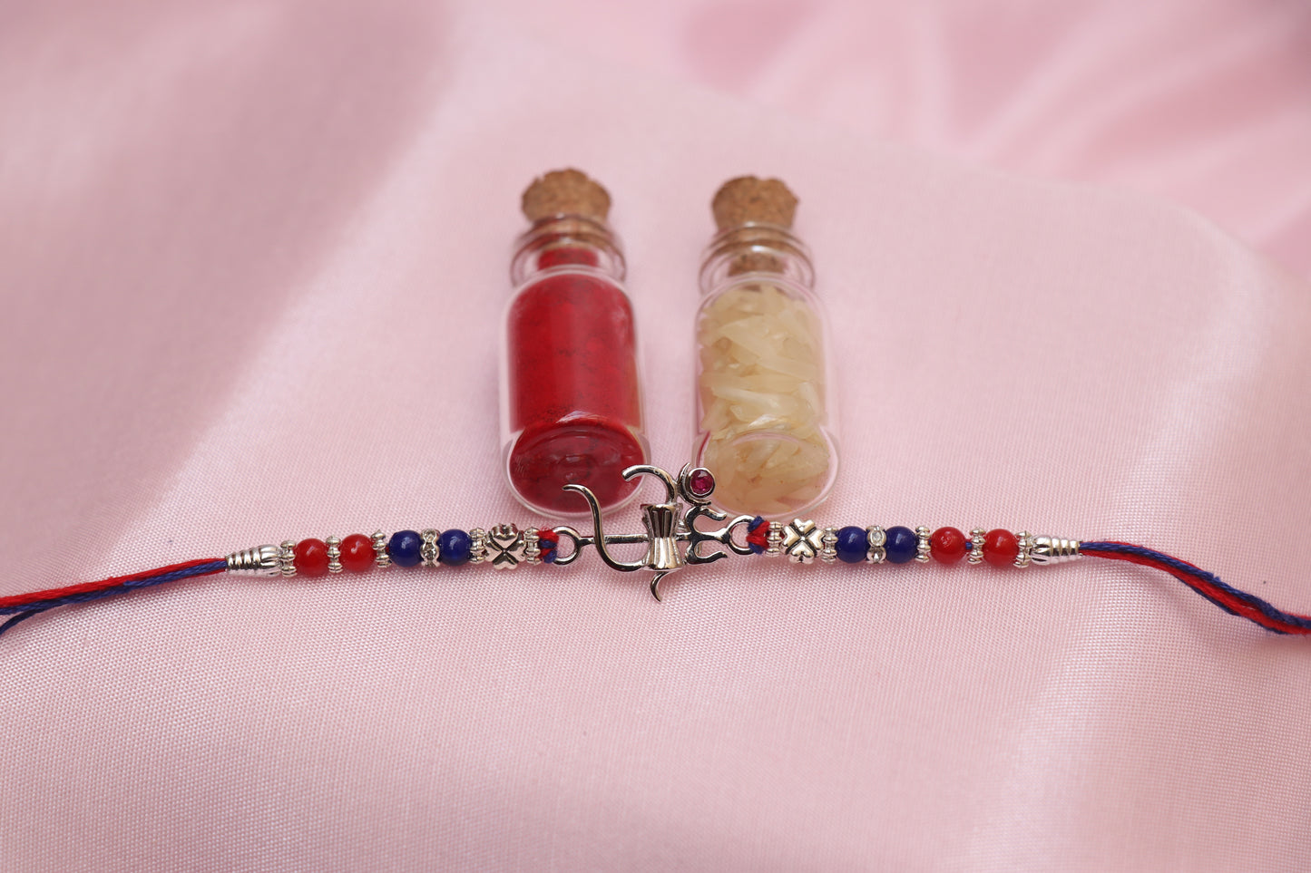 Om Trishul Red Stone Silver Rakhi