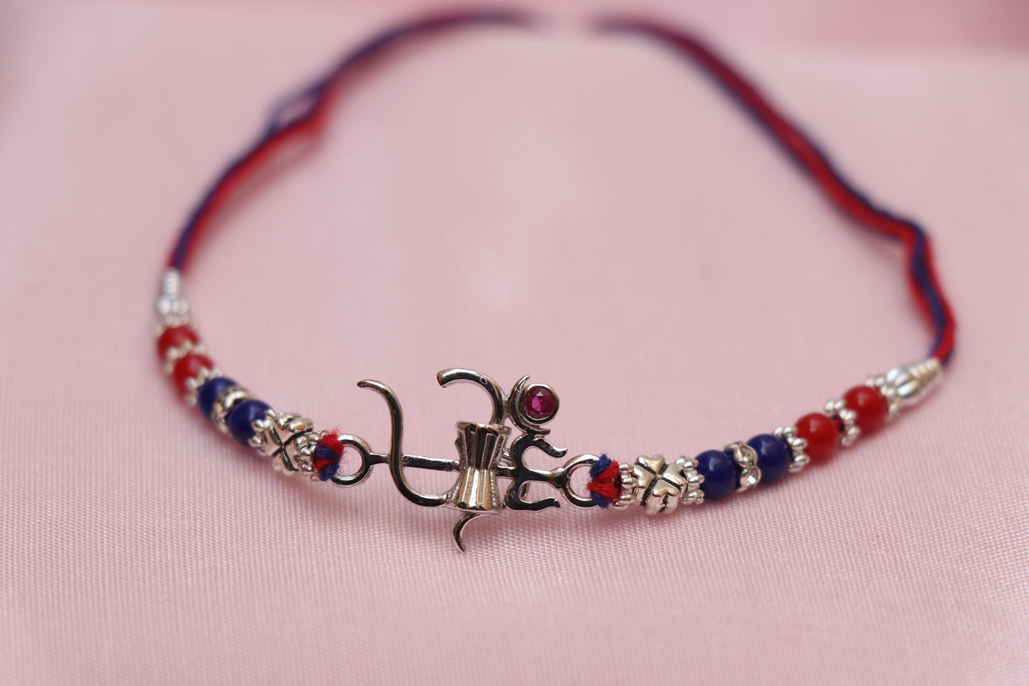 Om Trishul Red Stone Silver Rakhi